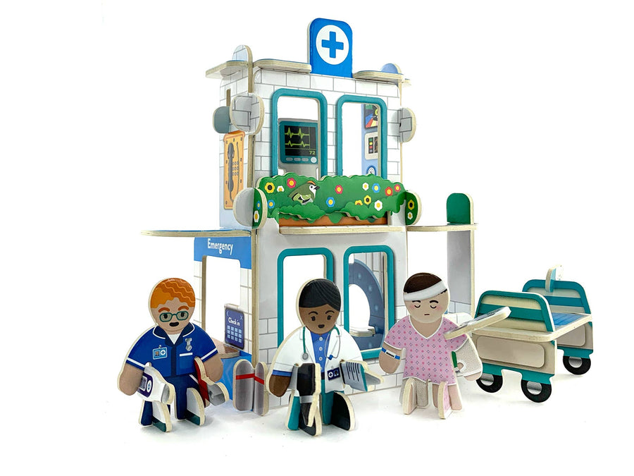 Toy medical building set with figurines on a white background