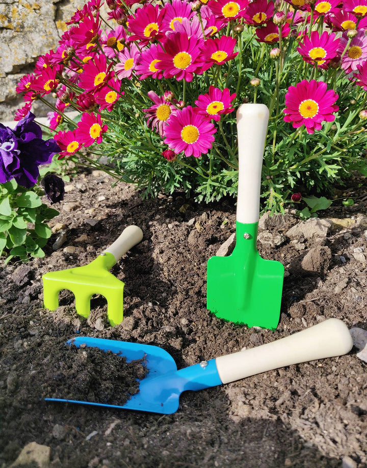 3 Piece Gardening Tool Set - Very Hungry Caterpillar. Light green rake, Green spade, blue shovel.