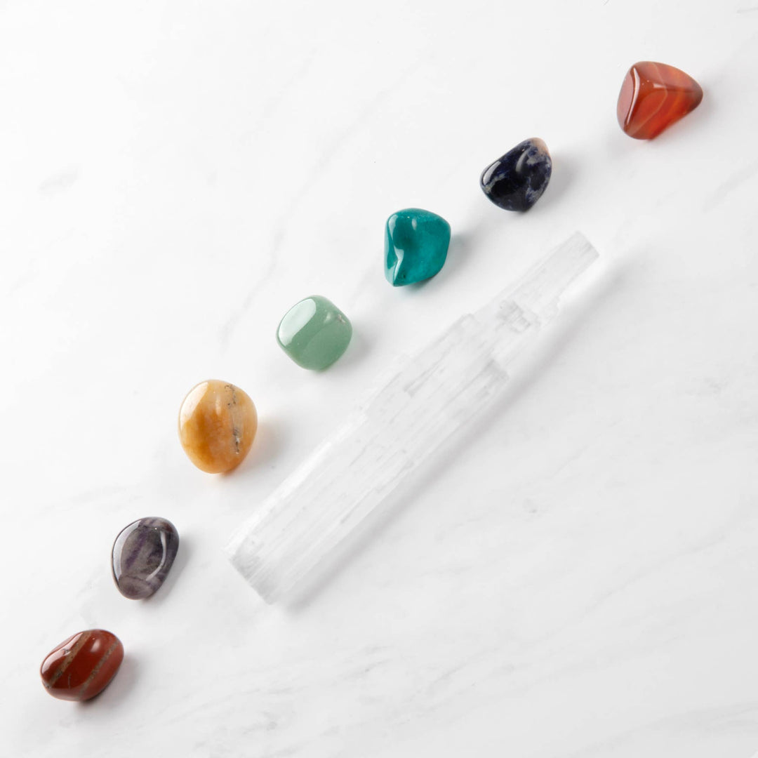 Set of colorful stones on a white surface