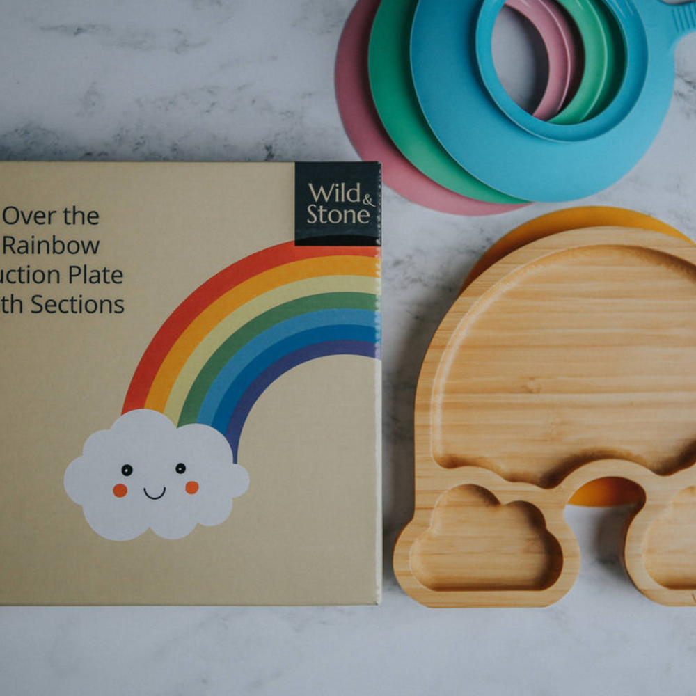 Bamboo rainbow shaped section plate with a suction base for easy feeding.