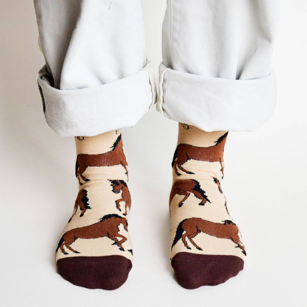 Bamboo socks with horse print on cream and brown socks.