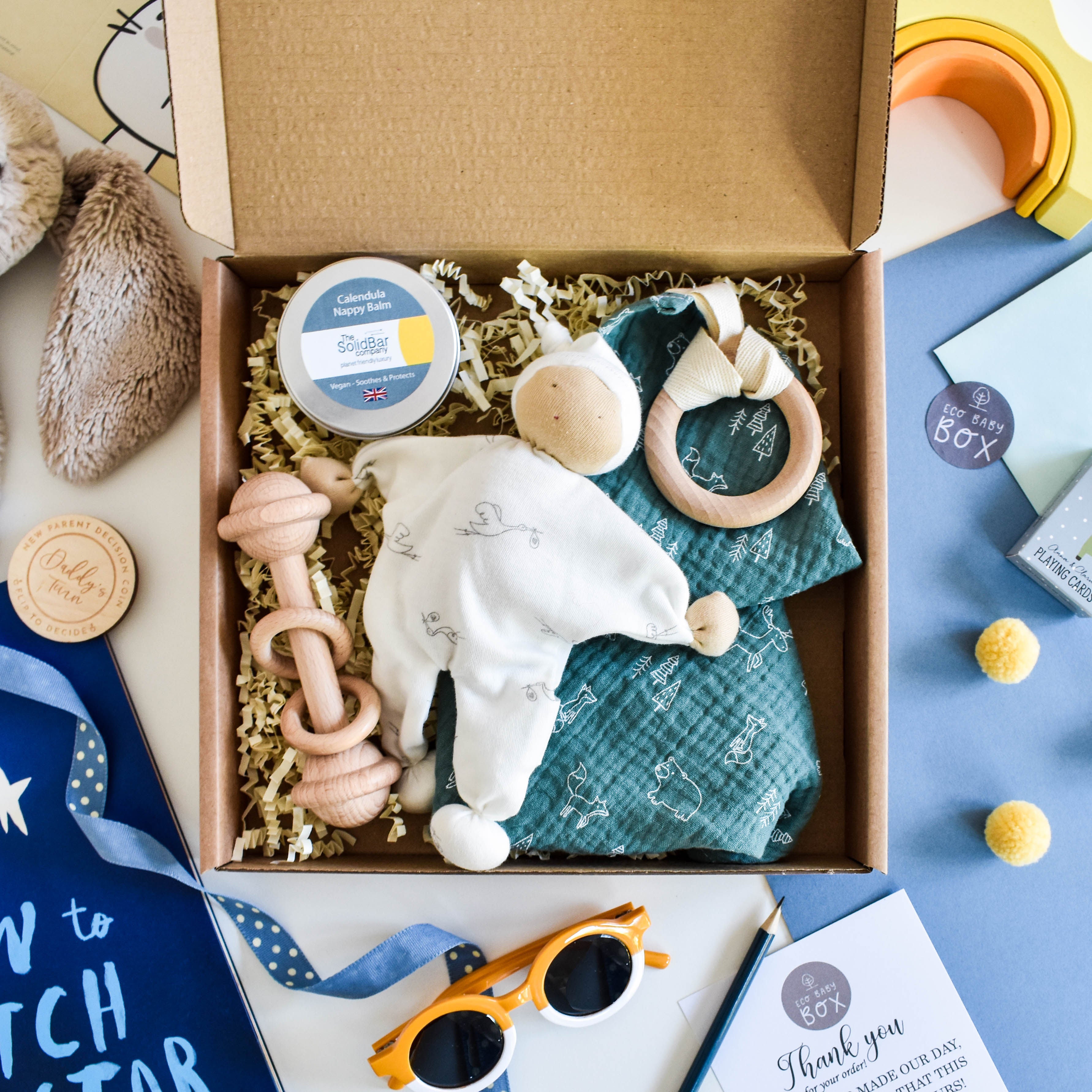 New baby Giftbox with a stork plush, comforter ring, rattle and nappy balm