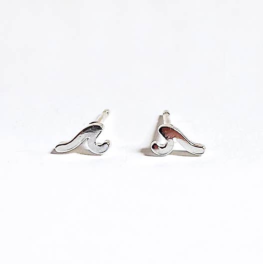 Dainty little wave earrings made from stainless steel. 