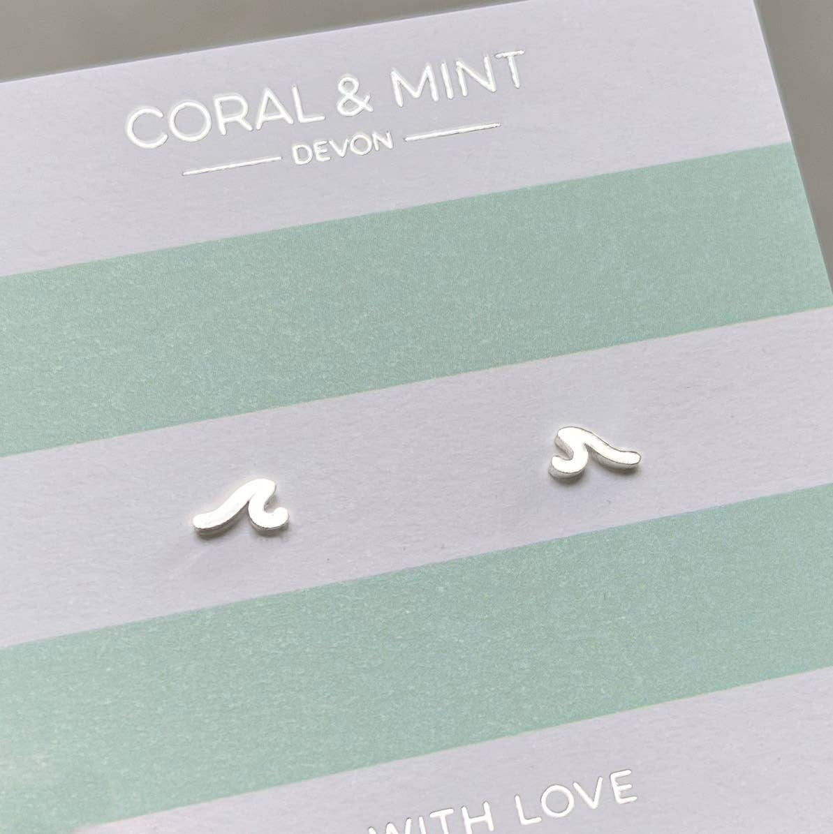Dainty little wave earrings made from stainless steel. 