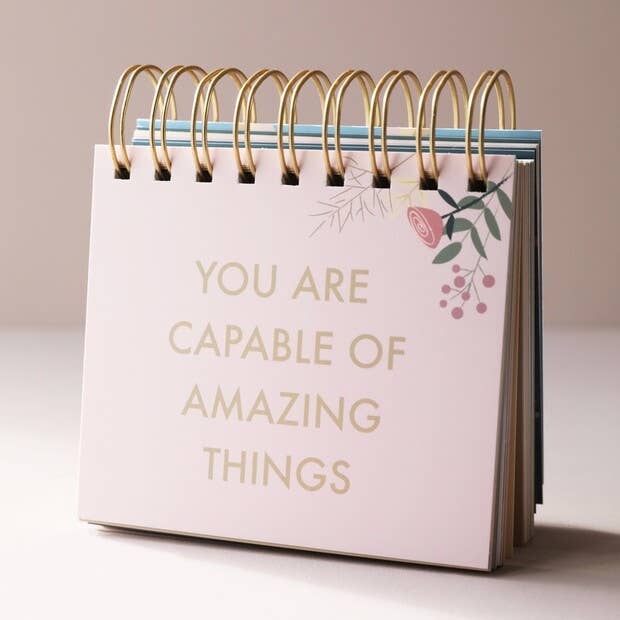 Beautifully floral illustrated flip chart featuring heart-warming quotes to help you on your way to a more positive outlook. This wonderful flip chart makes a great desk accessory and makes a great token gift for a friend or loved one in need of a cheer-up.