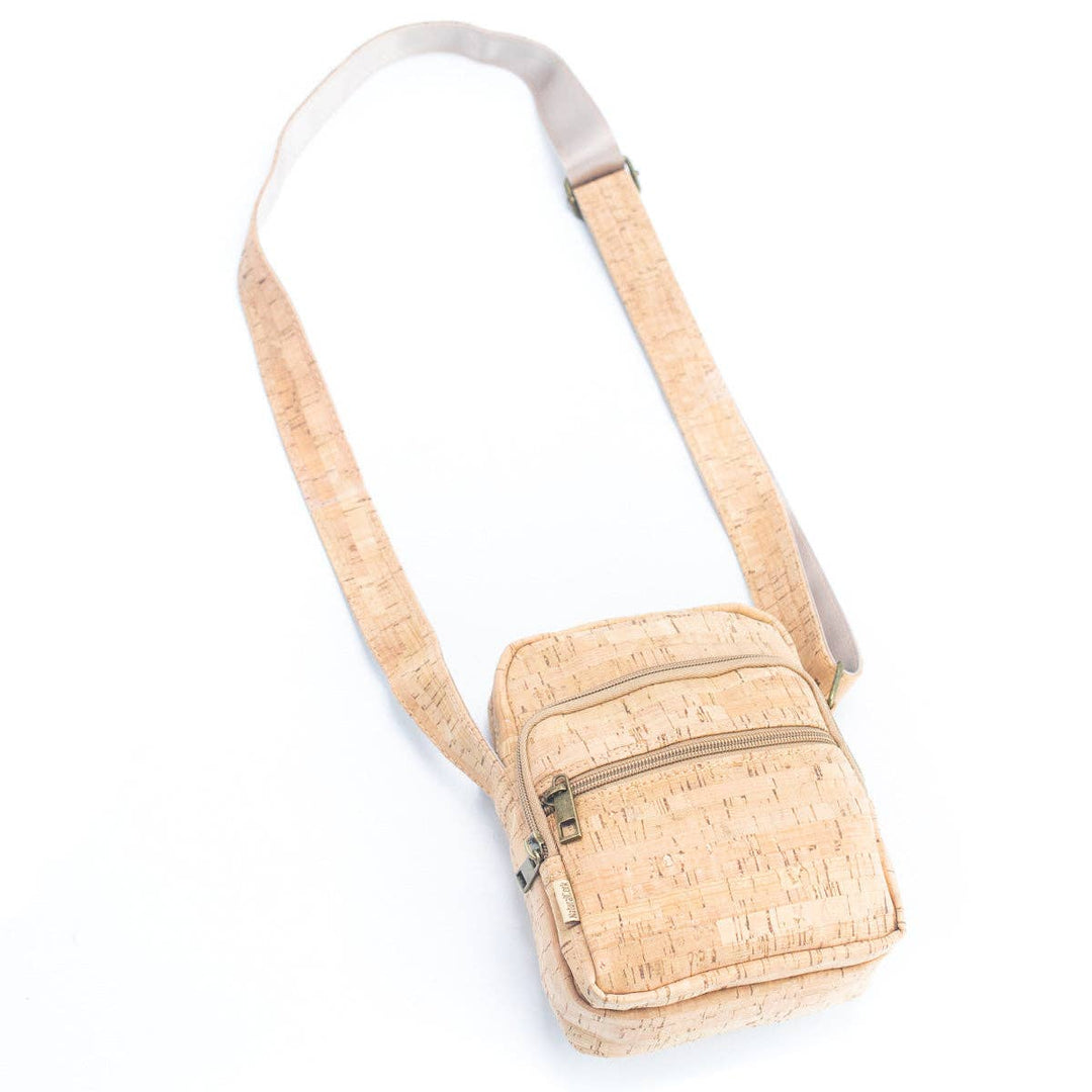 Cork crossbody bag on a white background