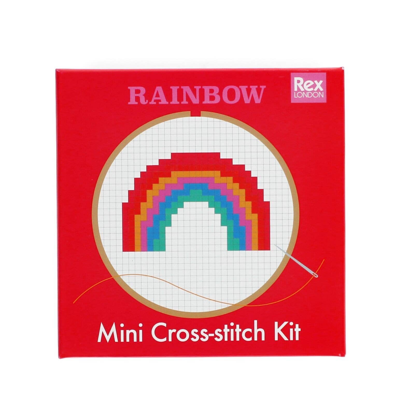Red box of a mini cross-stitch kit with a rainbow design on a white background