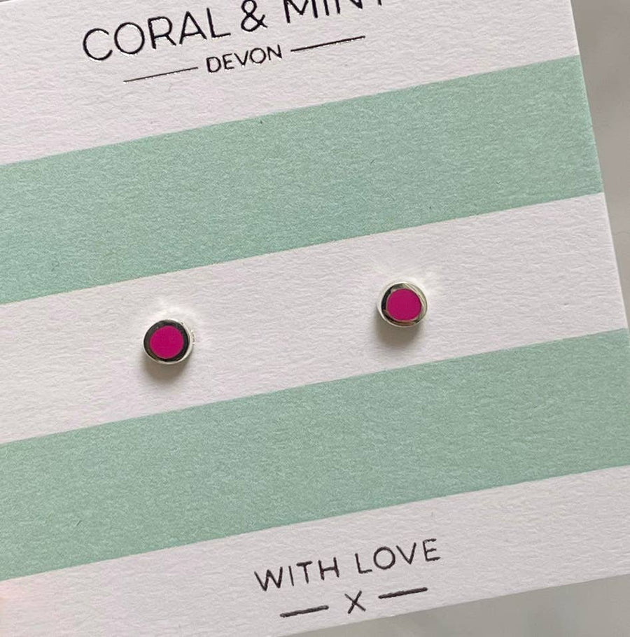 Pink stud earrings on a striped card with 'Coral & Mint Devon' branding.