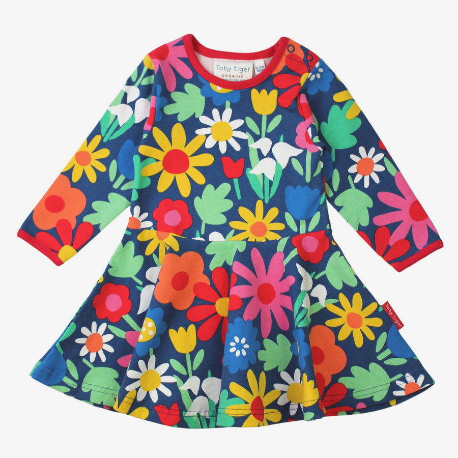 Colorful floral dress with long sleeves on a white background