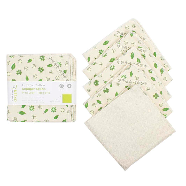 Set of organic cotton towels with green leaf pattern on a white background