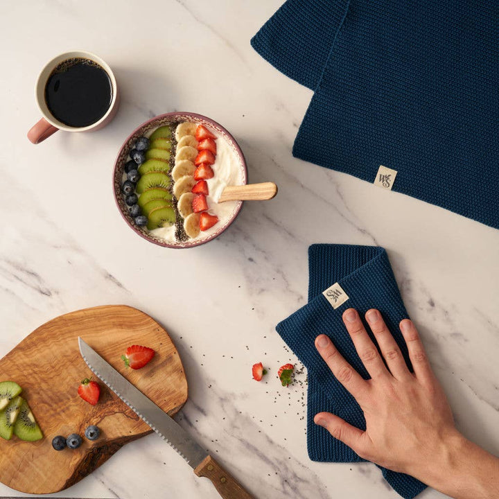 Organic cotton dishcloth in ocean blue colour.