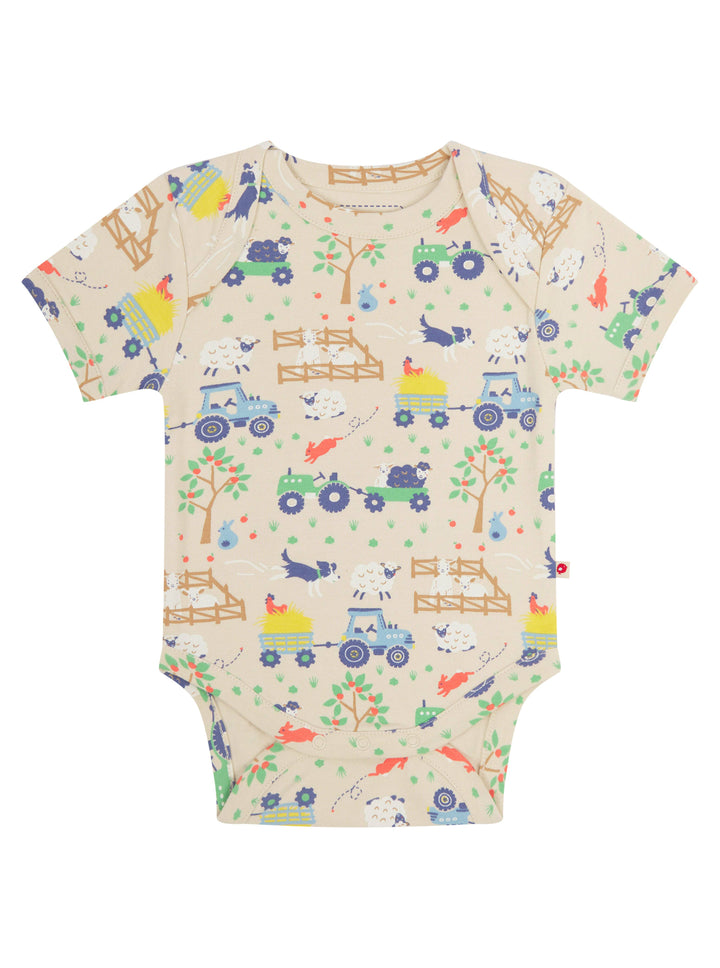 Double pack of organic cotton baby bodysuits. One bodysuit features an all-over farm print on a beige base with tractors and animals.