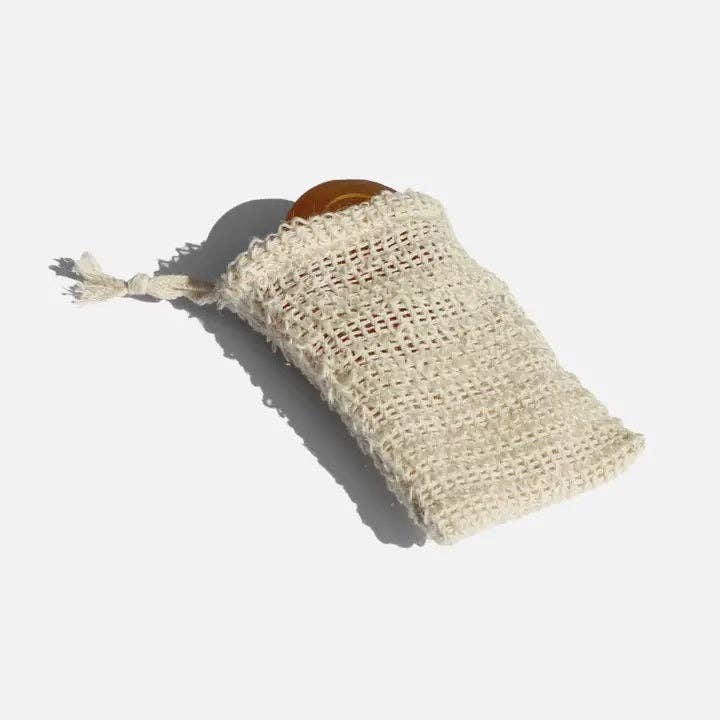 Woven bag with a wooden object on a white background