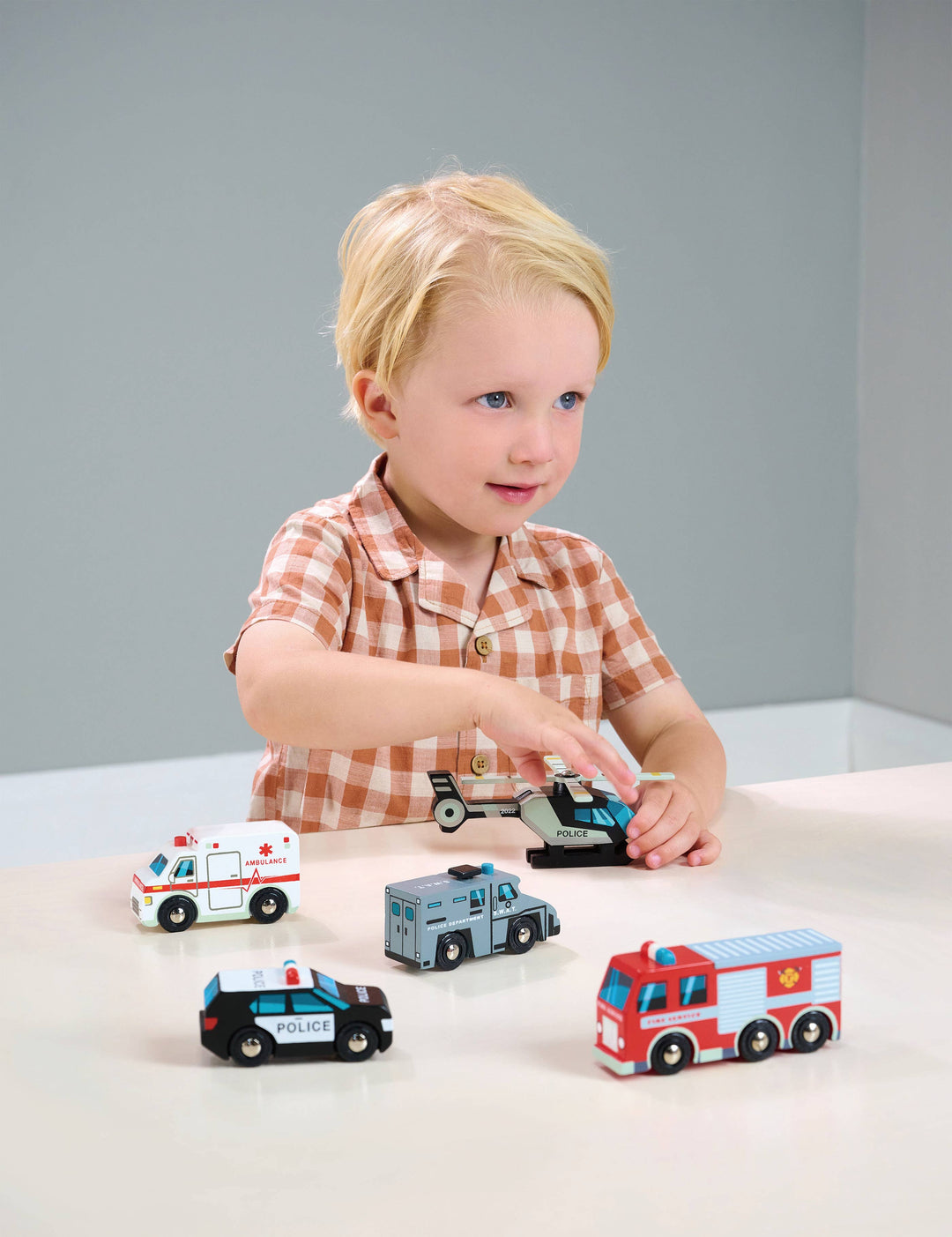 Children's wooden emergency vehicle toys. 