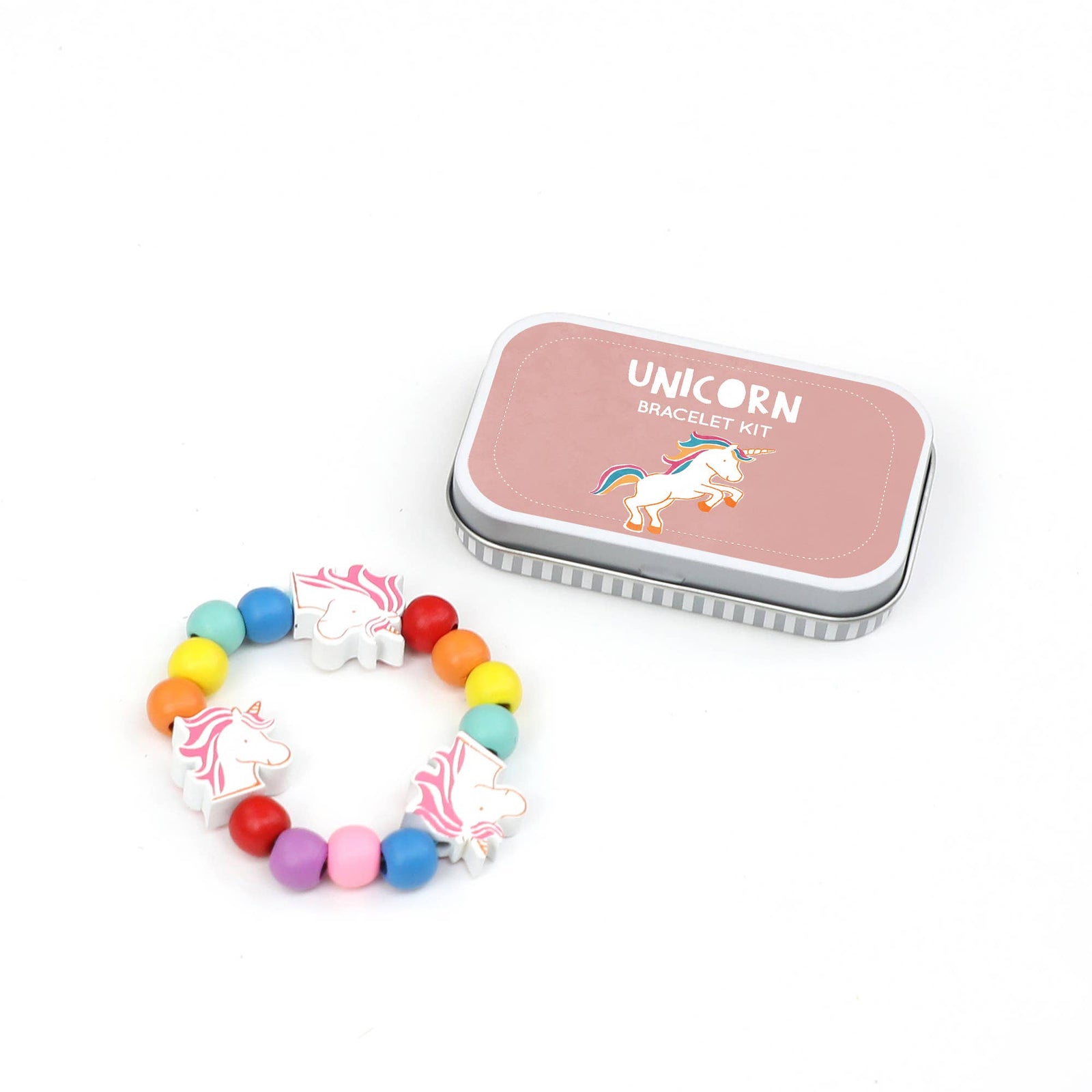 A unicorn bracelet next to its packaging tin, featuring a variety of beads including wooden unicorn beads, on a white background.