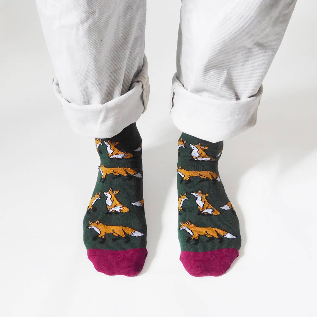 Bamboo socks with fox print on green and burgundy socks.