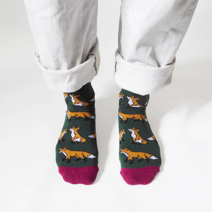 Bamboo socks with fox print on green and burgundy socks.