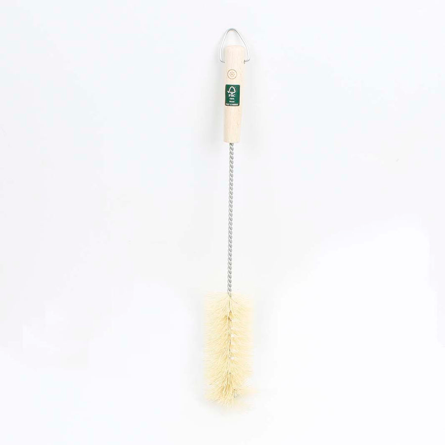 Bottle cleaning brush with a white handle and natural bristles on a light gray background