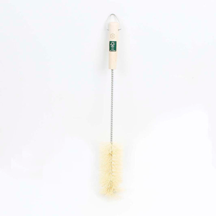 Bottle cleaning brush with a white handle and natural bristles on a light gray background
