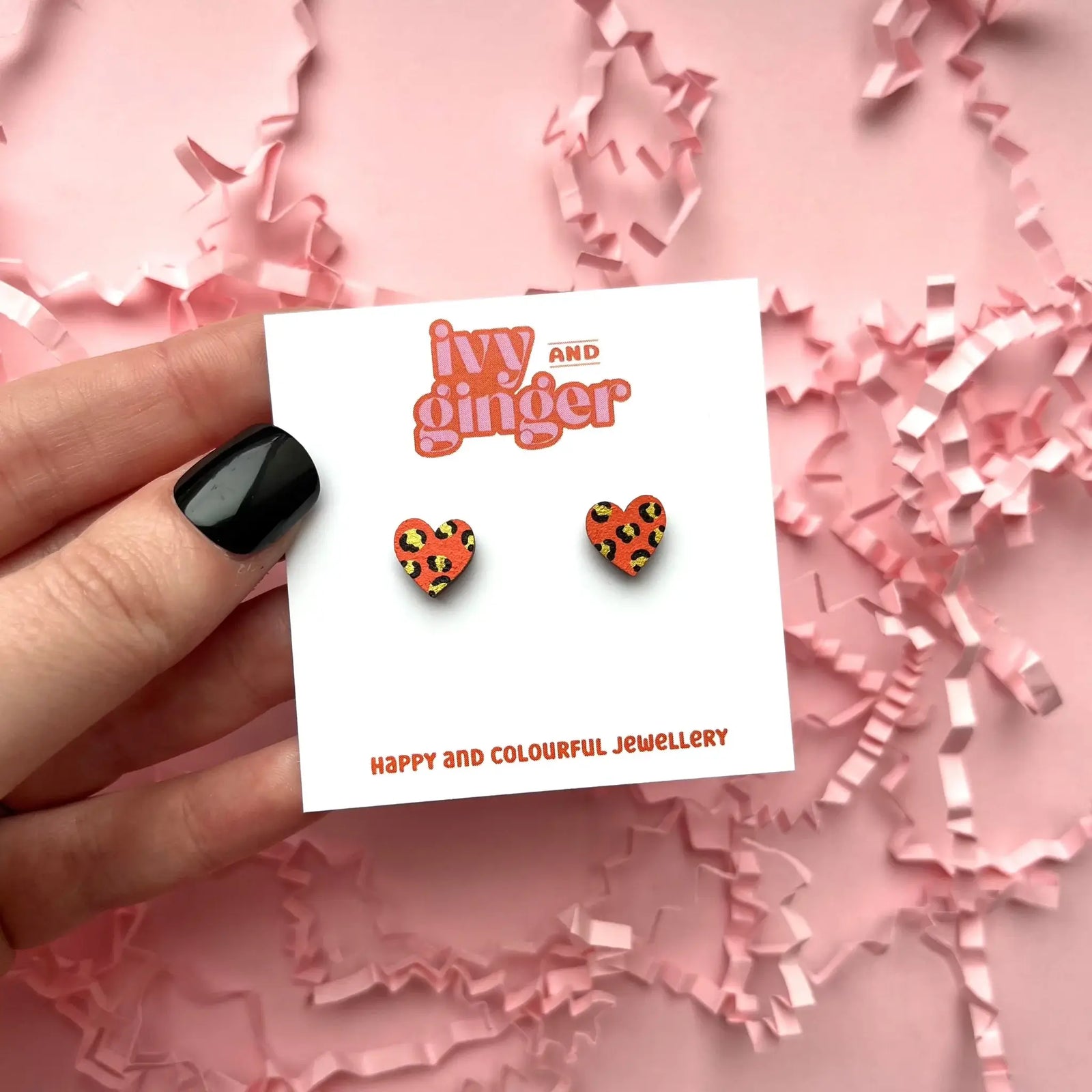 Wooden Leopard Print Studs with surgical steel findings.