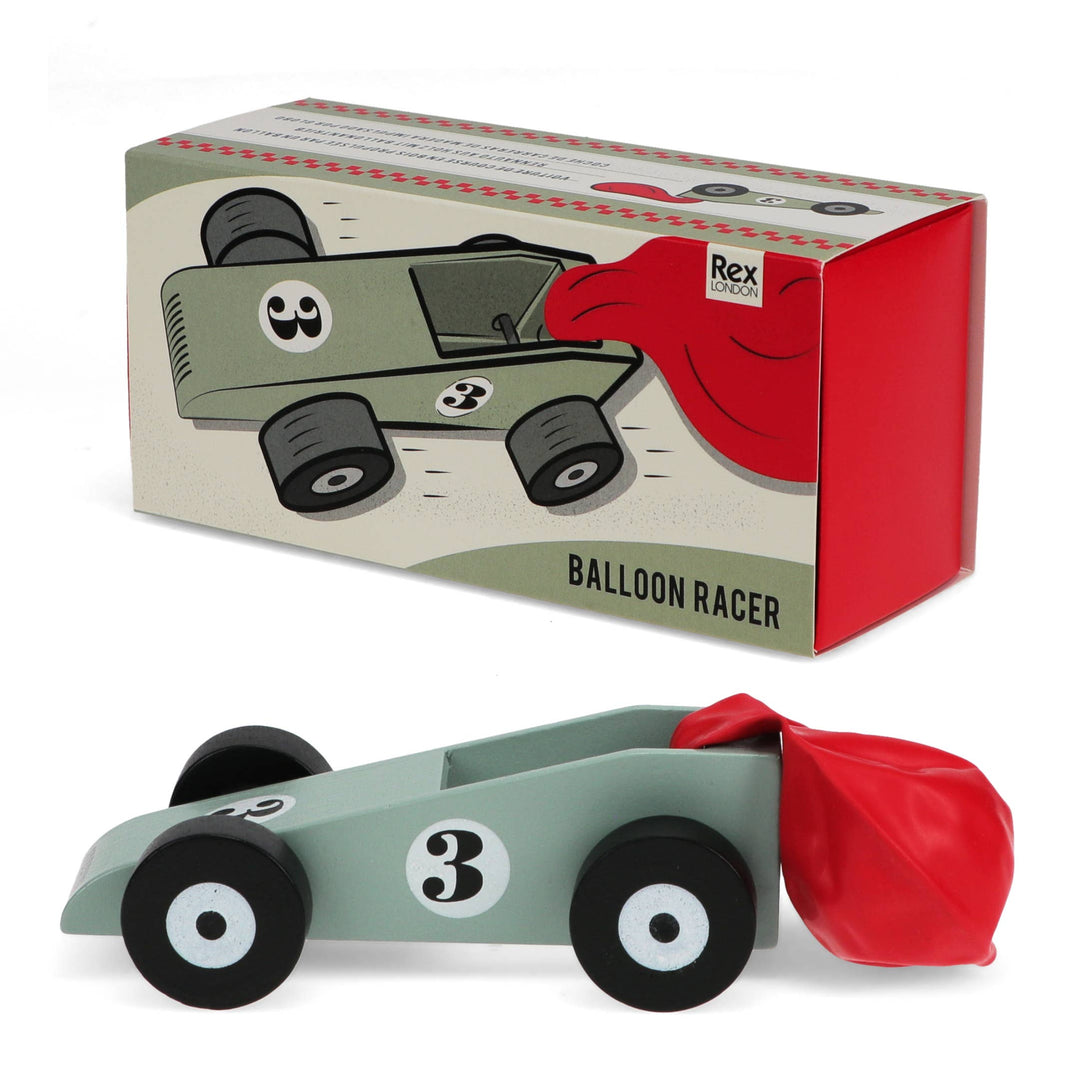 Balloon racer toy with red balloon and packaging featuring a cartoon race car.