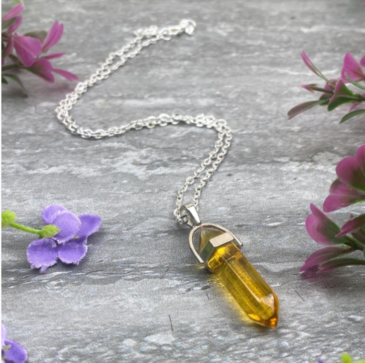 Onyx will help you find your inner strength to help you stand firm. The citrine pendant is vibrant in colour and energy,The pendant is attached to a silver chain which is approx. 2.5mm thick and 18 inches long. 