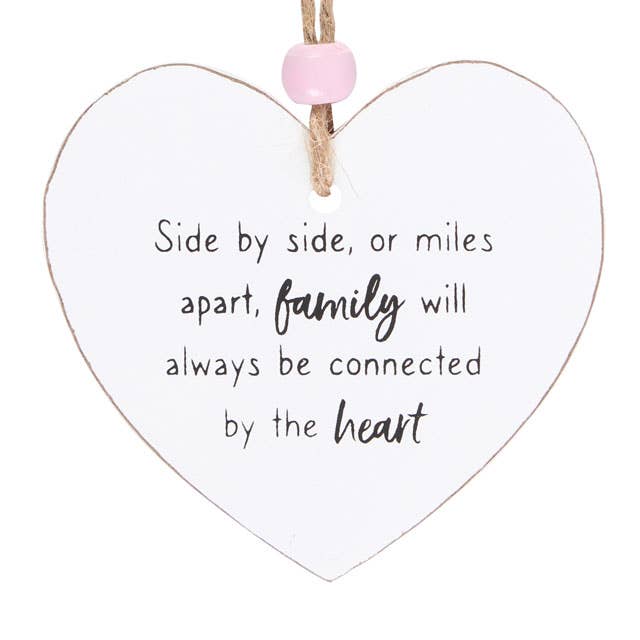 Wooden hanging heart sign with message Side by side or miles apart, family will always be connected by the heart.  