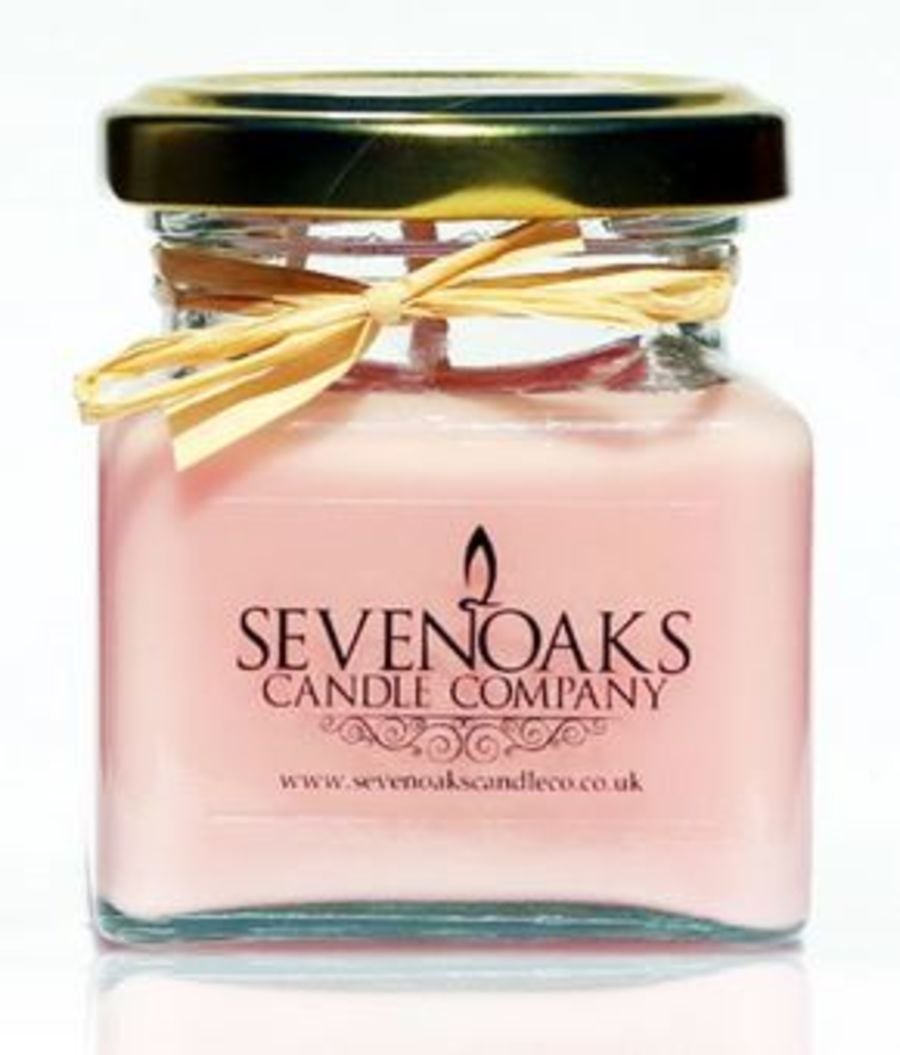 Soy candle English rose in a glass jar.