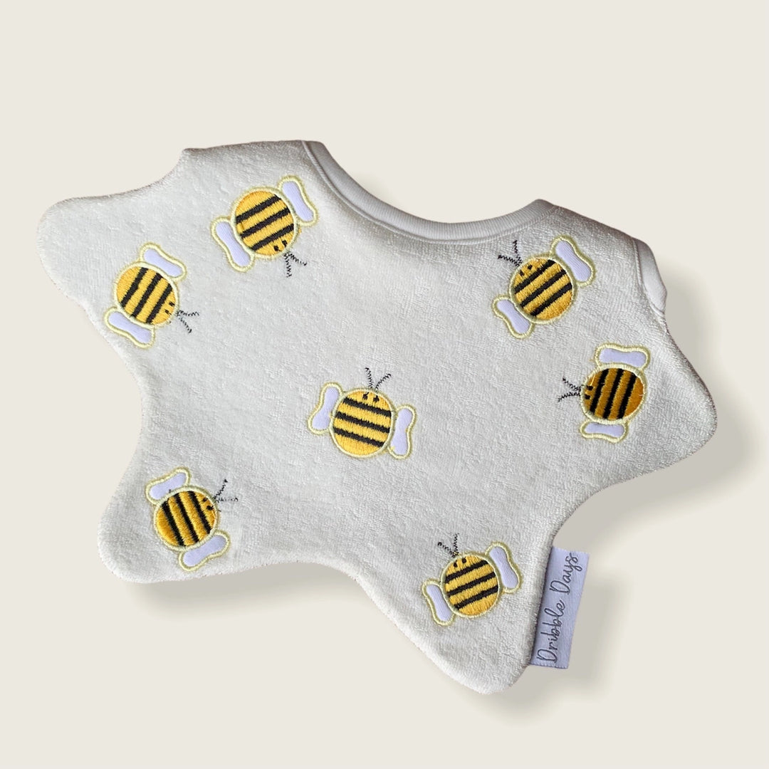 Baby dribble Bib made from 100% Terry towelling. Cream bumblebee design.