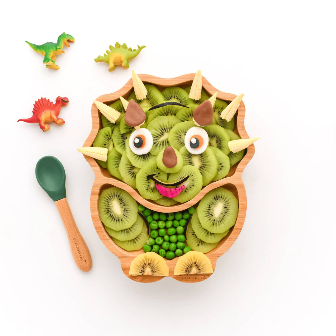Children's suction plate in a dinosaur shape.