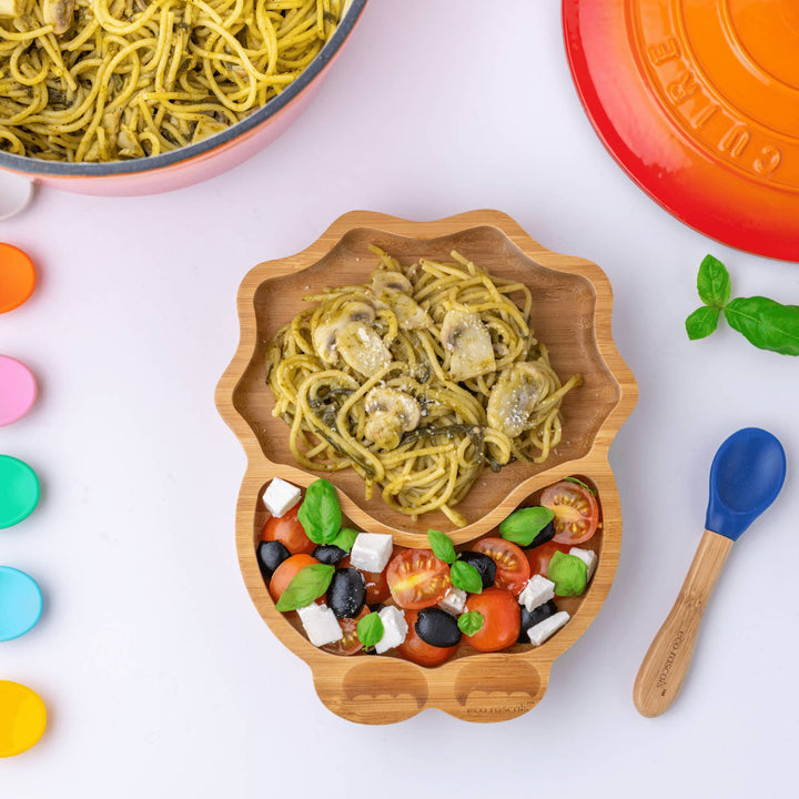 Children's suction plate in a dinosaur shape.