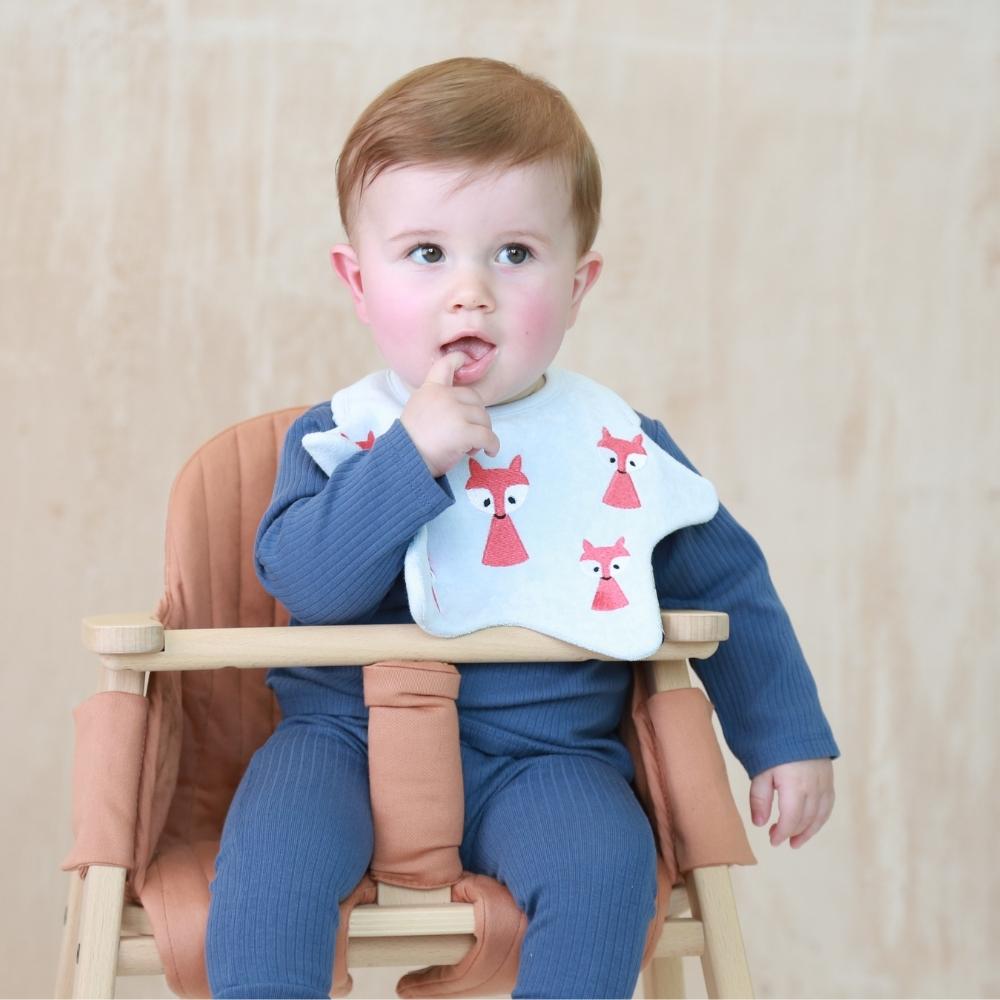 Baby dribble bib in a star shape. Blue fox design.