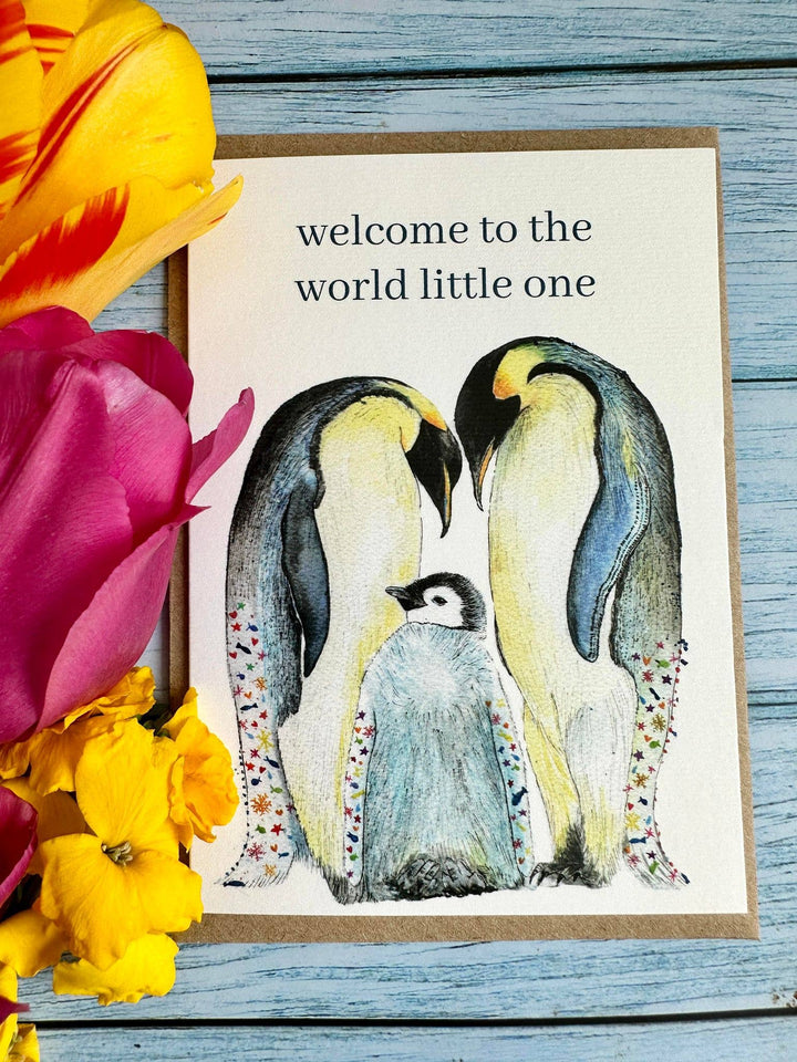 Welcome to the world new baby card with penguin family 