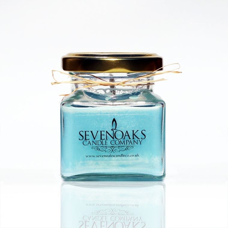 Soy bluebell candle in a glass jar.