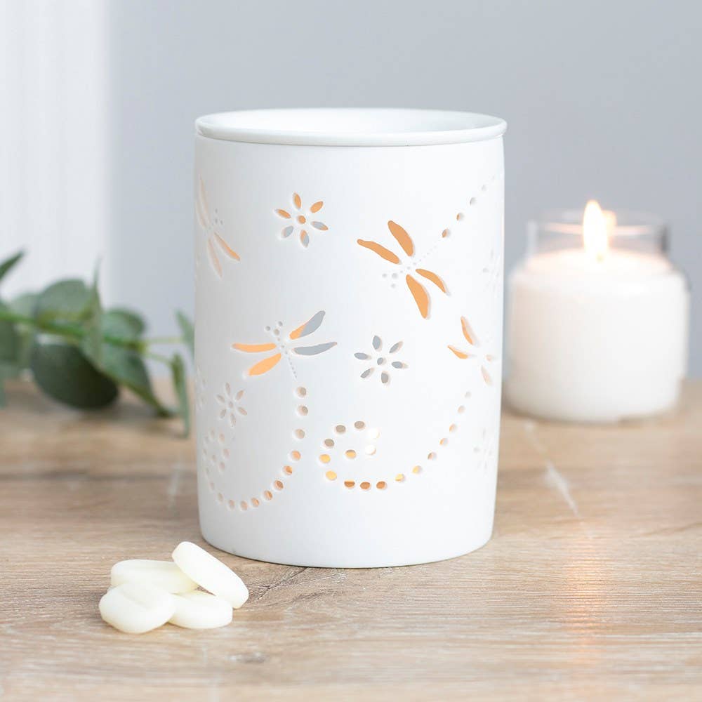 Oil burner ceramic dragonfly cutout with an unglazed finish. This item can also be used as a wax melt burner