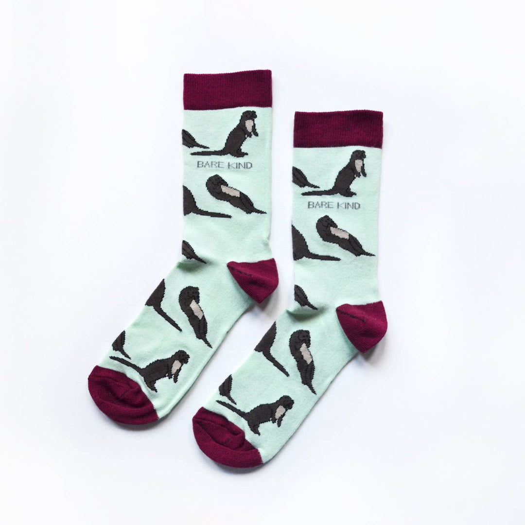 Bamboo socks with otter print on light blue and burgundy socks.